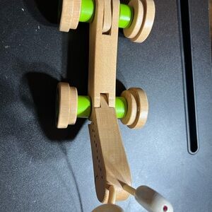 Classic Wooden Pull Toy Grasshopper with Green Wheels
